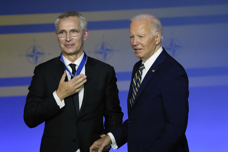 President Joe Biden, right, presents NATO Secretary General Jens Stoltenberg with the Presidential Medal of Freedom on the 75th anniversary of NATO at the Andrew W. Mellon Auditorium, Tuesday, July 9, 2024, in Washington(AP Photo/Susan Walsh)