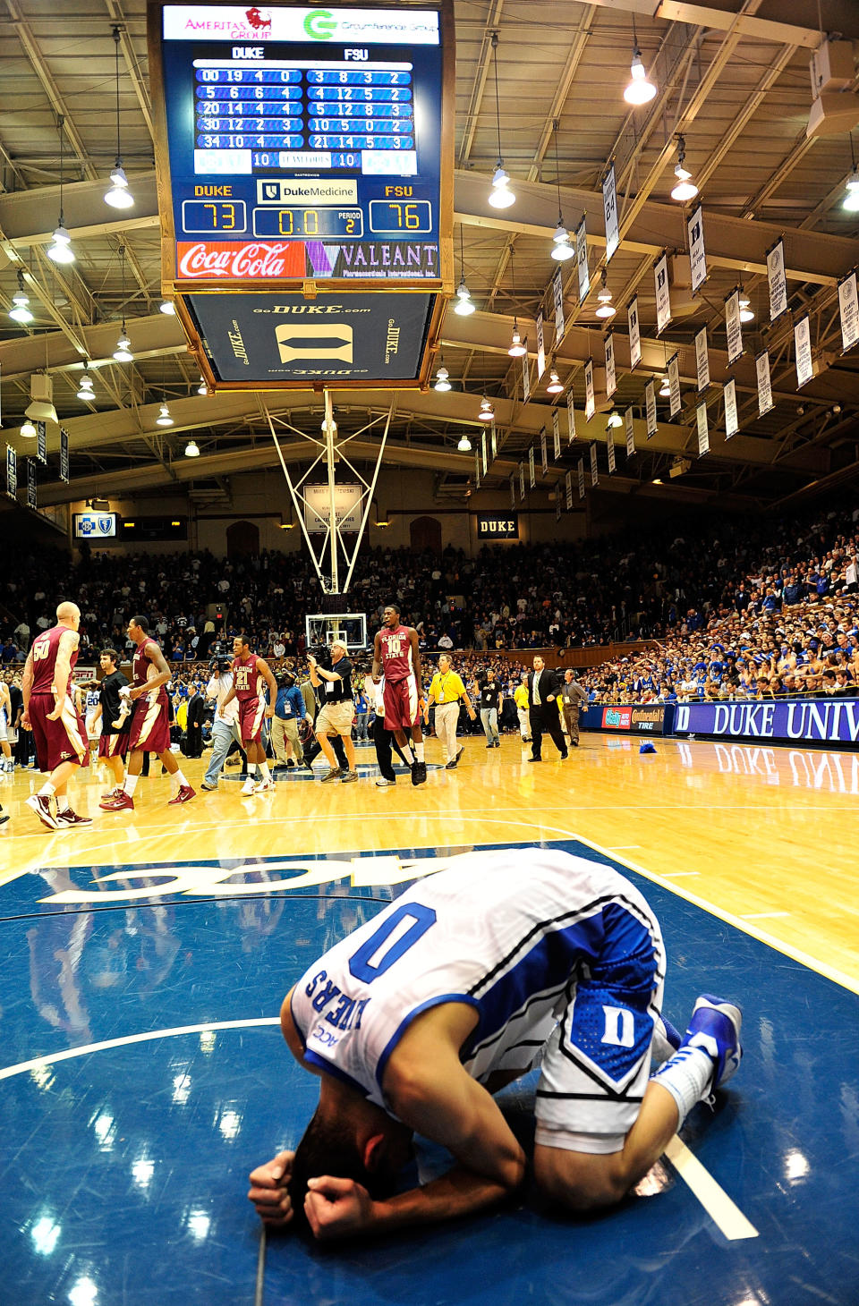 DURHAM, NC - JANUARY 21: Austin Rivers #0 of the Duke Blue Devils reacts after a loss to the Florida State Seminoles at the buzzer at Cameron Indoor Stadium on January 21, 2012 in Durham, North Carolina. Florida State won 76-73 to end Duke's 44-game home winning streak. (Photo by Grant Halverson/Getty Images)
