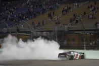 Myatt Snider does a burnout after winning the NASCAR Xfinity Series auto race Saturday, Feb. 27, 2021, at Homestead-Miami Speedway in Homestead, Fla. (AP Photo/Wilfredo Lee)