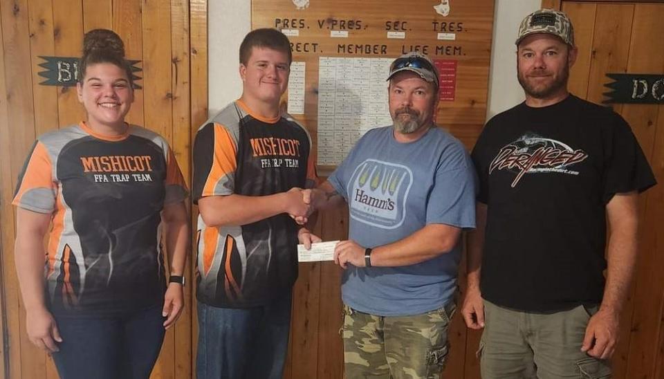 Larrabee Sportsmans Club is presenting the $1,400 check to the coaches of the Mishicot FFA Trap Team. From left are coach Katie Koeppel, coach Logan Marshall, Larrabee Sportsmans Club President Paul Tuschel and Archery Chairman Jason Hill.