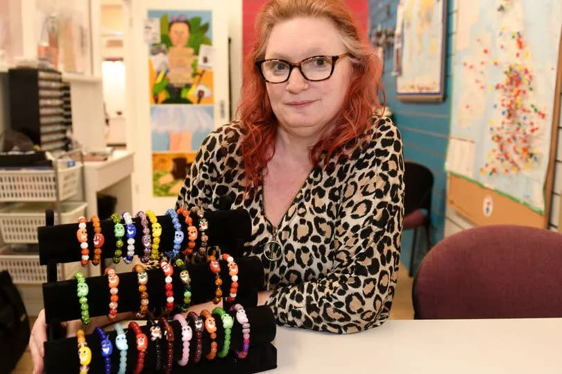 Heather Davis with her beaded jewellery for children with kidney disease