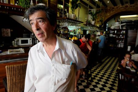 Restaurant manager Antonio Aguado talks to Reuters TV in Javea near Alicante, Spain, after Britain voted to leave the European Union in the EU Brexit referendum, June 24, 2016. REUTERS/Heino Kalis