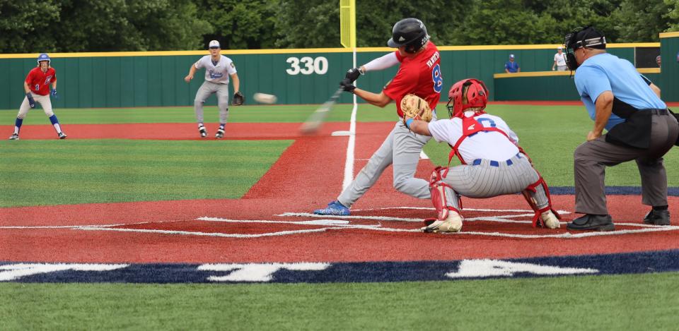 Cambridge Post 84's Drew Yanico (8) connects during American Legion district action with Beverly-Lowell on Monday at Marietta College's Don and Sue Schaly Field.