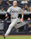 Tampa Bay Rays' Michael Brosseau scores on Yandy Diaz's sixth-inning ground-rule double in a baseball game against the New York Yankees on Tuesday, July 16, 2019, in New York. (AP Photo/Kathy Willens)