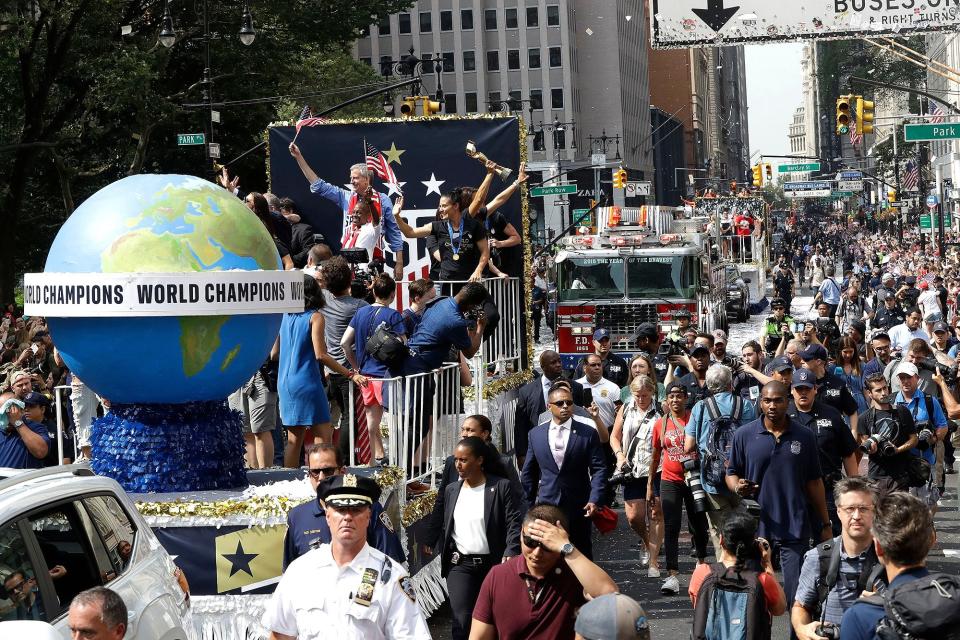 The soccer team rode on a float in New York City.
