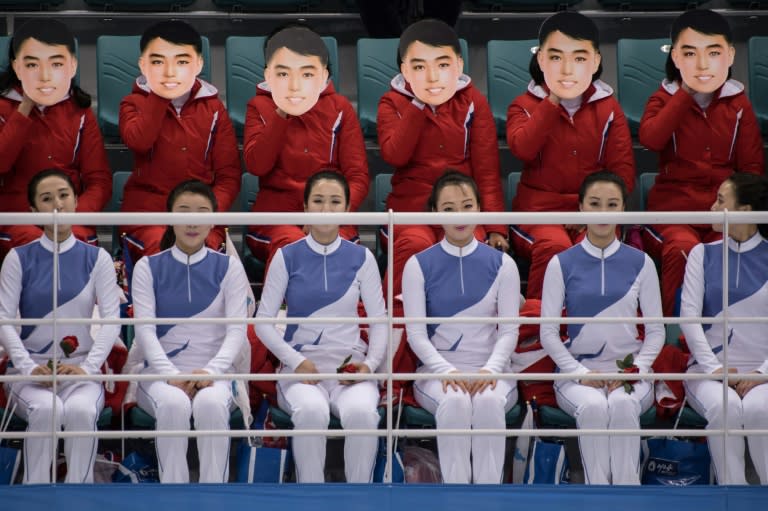 The North Koreans have worn identical masks and sang a 600-year-old Korean folk song during their synchronised performances