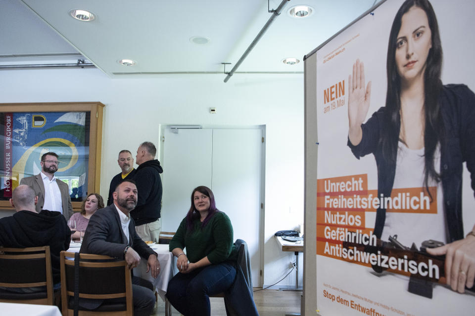 Meeting rooms and a poster of the committee against the EU gun laws and policies, prior to the committee's meeting in Burgdorf, Switzerland, Sunday, May 19, 2019. Swiss voters clearly accepted EU's stricter gun control at the national ballot. (Peter Schneider/Keystone via AP)