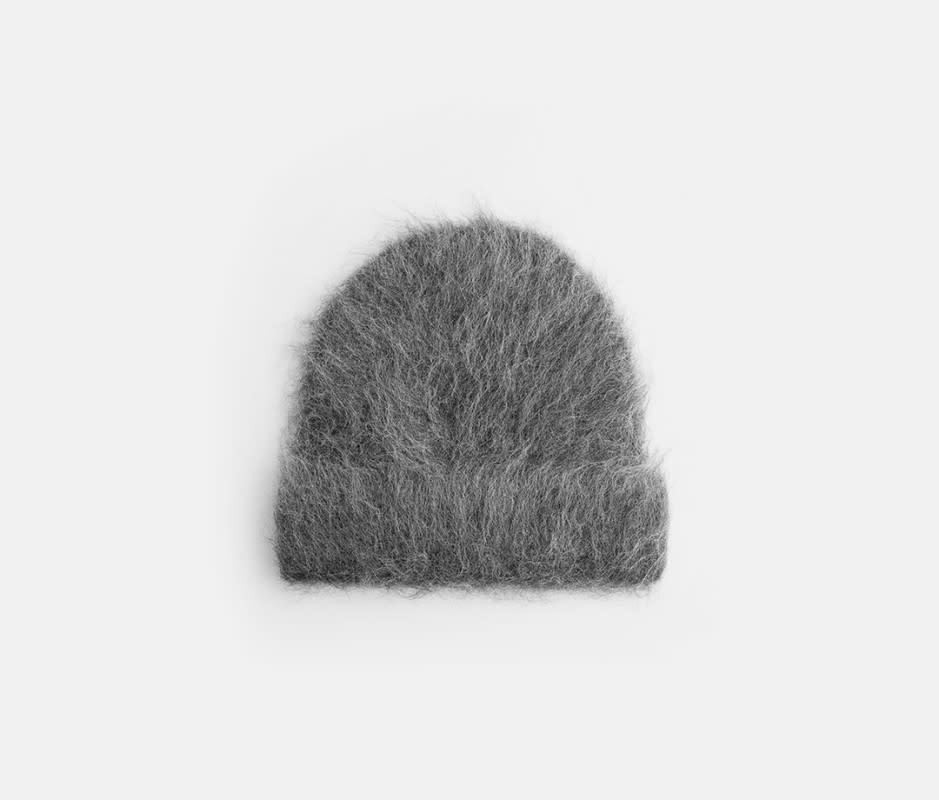 <p>Courtesy Image</p><p><strong>Material:</strong> 78% alpaca, 19% nylon, 3% elastane</p><p>Hats off to Séfr, a Swedish brand that masterfully blends retro inspiration with modern craftsmanship. The <a href="https://go.skimresources.com?id=106246X1712071&xs=1&xcust=mj_mensbeanies_pjebara_101323&url=https%3A%2F%2Fwww.farfetch.com%2Fshopping%2Fmen%2Fsefr-alpaca-wool-blend-brushed-beanie-item-21334270.aspx" rel="noopener" target="_blank" data-ylk="slk:Fuzzy Beanie;elm:context_link;itc:0;sec:content-canvas" class="link ">Fuzzy Beanie</a> is a standout piece, woven from a luxurious brushed baby alpaca that feels as ridiculously soft as it looks. The folded cuff also offers customizable comfort, allowing you to adjust the fit to your liking. With its quirky yet sophisticated design, this beanie is more than just a head warmer—it's a subtle statement piece that promises to keep you cozy no matter what.</p>