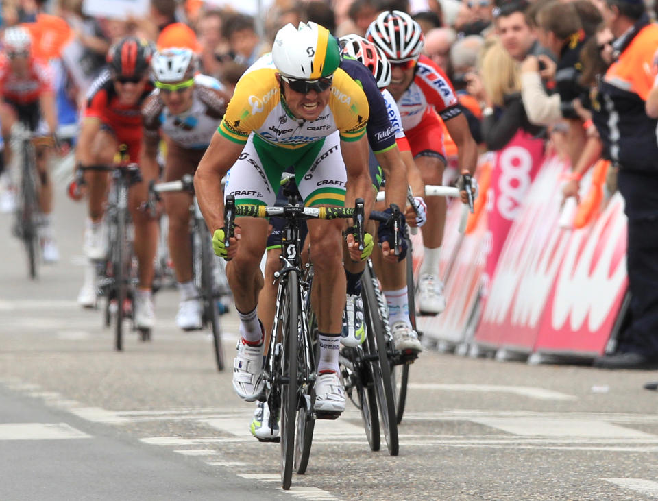 Australia's Simon Gerrans of the Orica Greenedge team sprints to win the 100th edition of the Belgian cycling classic and UCI World Tour race Liege-Bastogne-Liege, in Ans, Belgium, Sunday, April 27, 2014. Spain's Alejandro Valverde of the Movistar team became second, Poland's Michal Kwiatowski of the Omega Pharma team was third. (AP Photo/Yves Logghe)