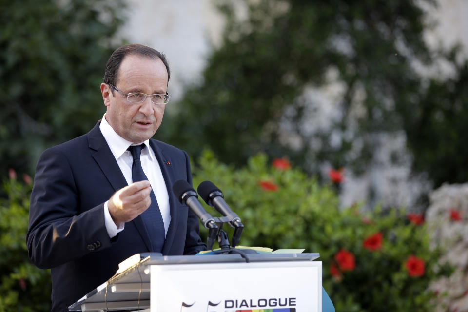 French President Francois Hollande addresses the press as he attends a Mediterranean summit of southern European and North African countries, in Valletta, Malta, Friday, Oct. 5, 2012.The Malta summit of five European and five African nations is expected to focus on fighting terrorism and lawlessness in North African as well as France's push for a military intervention in Mali, where Islamist rebels have taken control in the north. (AP Photo/Andrew Medichini)