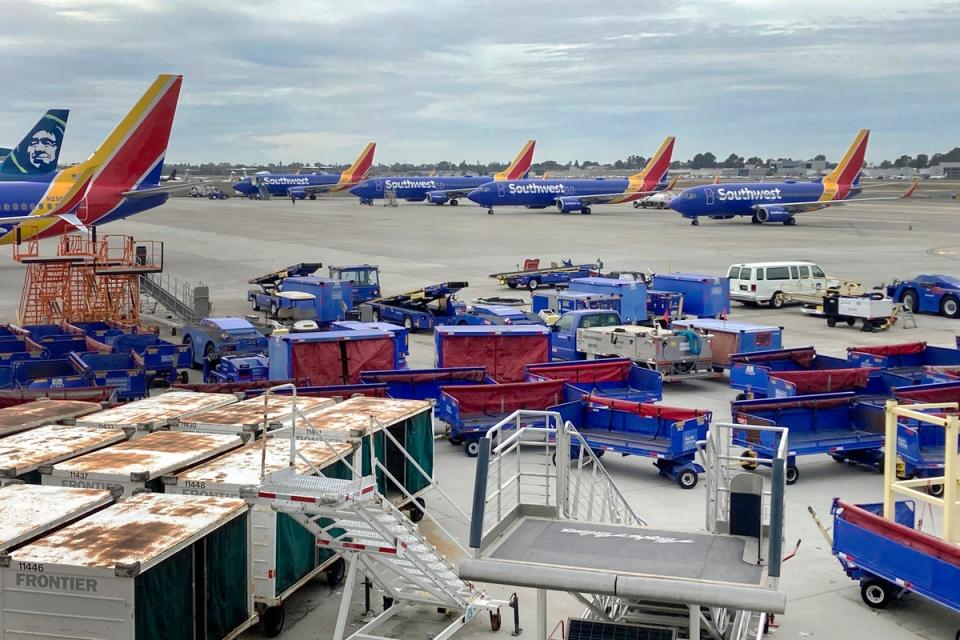 Southwest jets sit idle on a California runway amid thousands of cancellations (Copyright 2022 The Associated Press. All rights reserved)