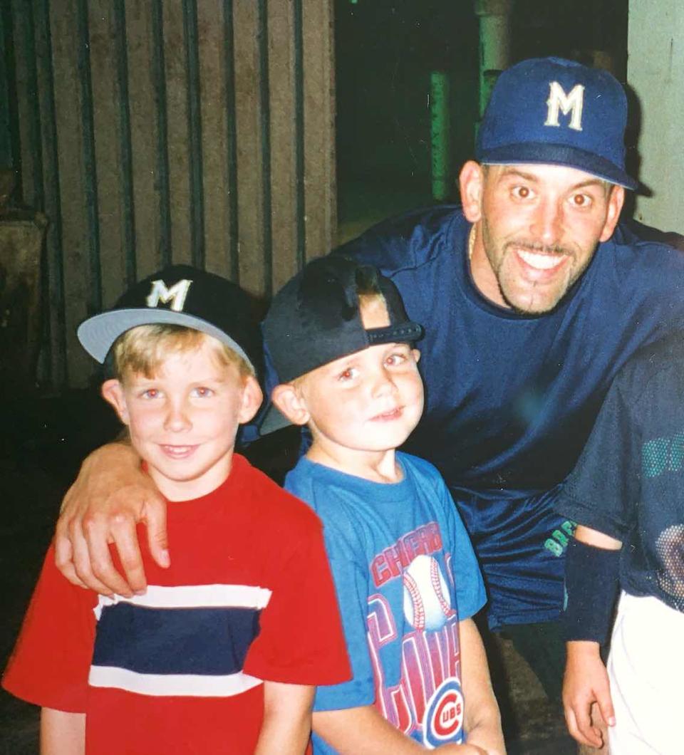 Jeff (left) and Ryan McNeil with former major leaguer Fernando Vina at Milwaukee County Stadium. (Courtesy of the McNeil family)