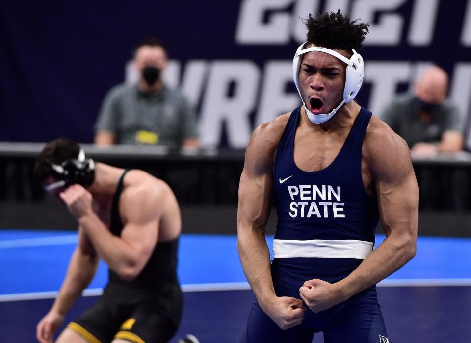 Penn State Nittany Lions wrestler Carter Starocci celebrates after defeating Iowa Hawkeyes wrestler Michael Kemerer in the championship match of the 174 weight class during the finals of the NCAA Division I Wrestling Championships at Enterprise Center. Mandatory Credit: Jeff Curry-USA TODAY Sports