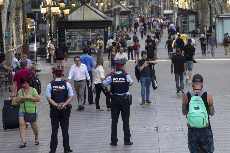 Far from empty: Las Ramblas on Friday morning (EPA)