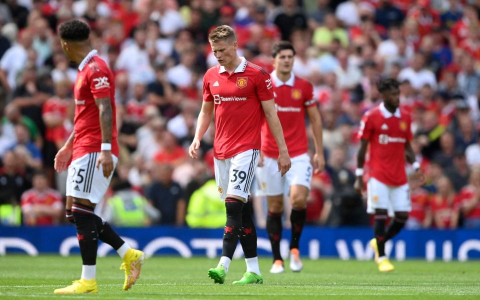 Soccer Football - Premier League - Manchester United v Brighton & Hove Albion - Old Trafford, Manchester, Britain - August 7, 2022 Manchester United's Scott McTominay and teammates react after conceding the first goal - REUTERS