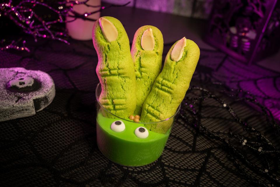 Disney's culinary team has created a variety of sweet and savory treats for the Halloween party. Pictured are the "zombie fingers," almond cookies with Key lime chocolate ganache, salted caramel crisp pearls and sugar eyes. This treat can be found at Cosmic Ray's Starlight Cafe exclusively at the Halloween party.