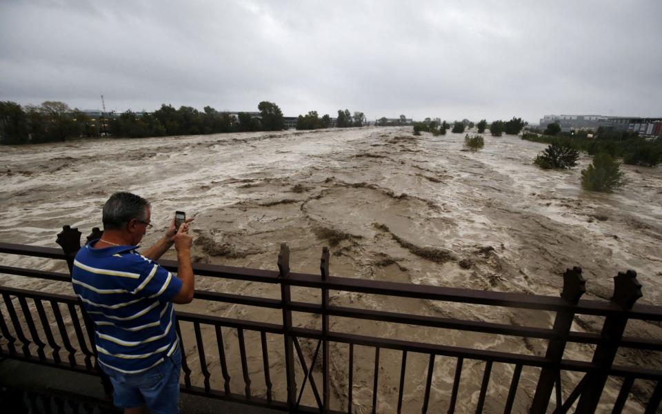 The flooded Var river during a powerful storm - Shutterstock