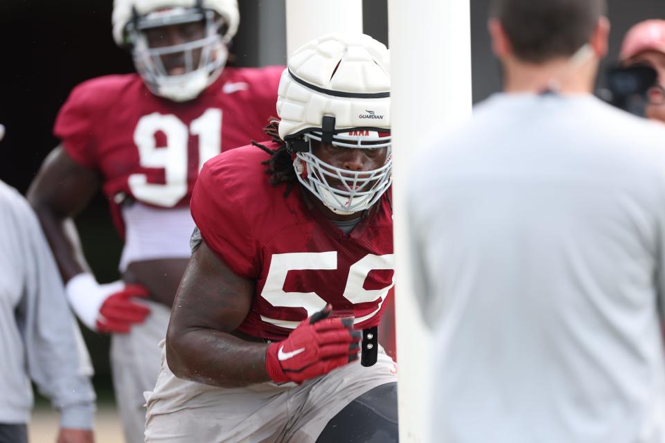 Alabama defensive lineman Anquin Barnes Jr. (59) runs drills during practice at Thomas-Drew Practice Fields in Tuscaloosa, AL on Wednesday, Aug 16, 2023.