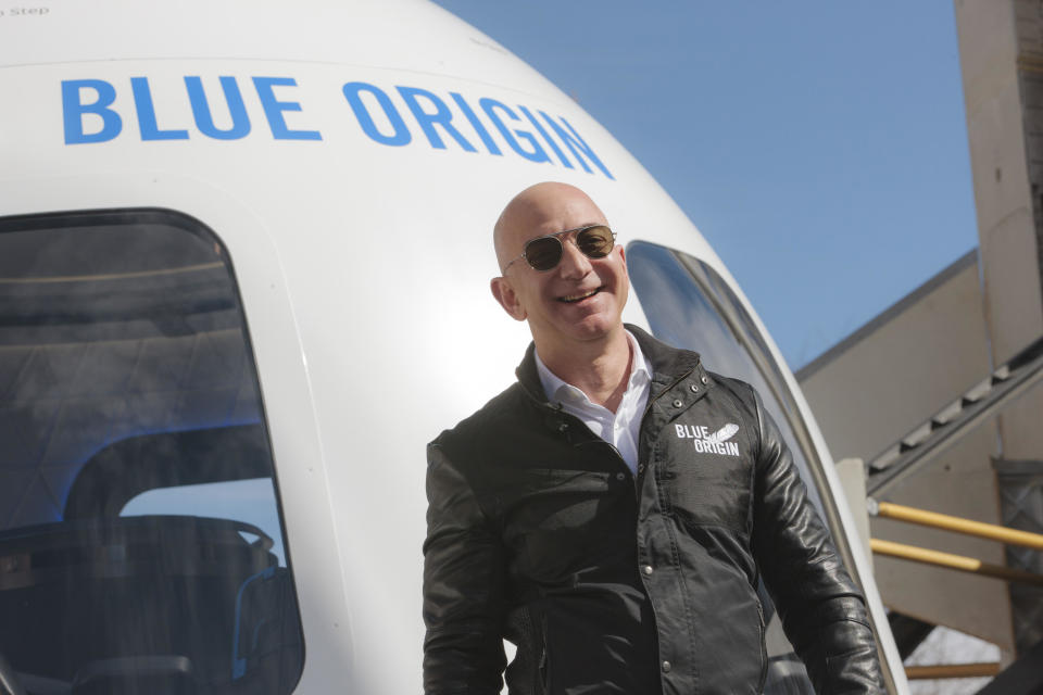 Jeff Bezos unveils the Blue Origin New Shepard system during the Space Symposium in Colorado Springs, on April 5, 2017.  / Credit: Matthew Staver/Bloomberg via Getty Images