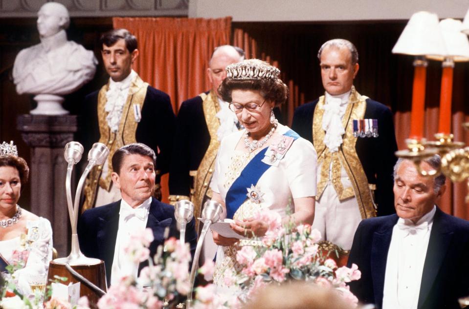 Ronald Reagan was one of 14 U.S. presidents who served during Queen Elizabeth II’s reign. <a href="https://www.gettyimages.com/detail/news-photo/the-queen-with-president-reagan-at-a-state-banquet-at-news-photo/52103686?adppopup=true" rel="nofollow noopener" target="_blank" data-ylk="slk:Tim Graham Photo Library via Getty Images;elm:context_link;itc:0;sec:content-canvas" class="link ">Tim Graham Photo Library via Getty Images</a>