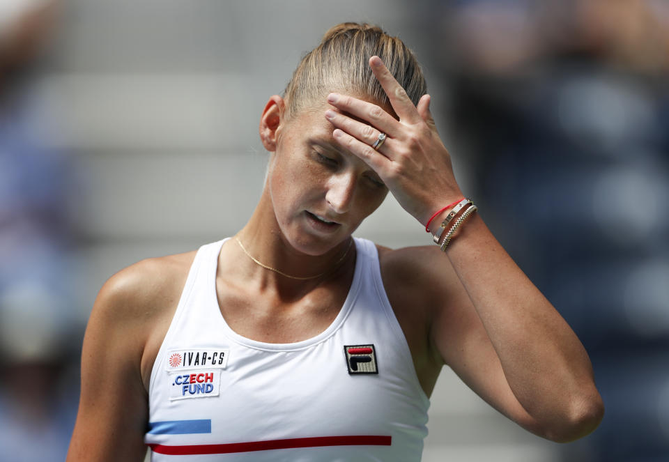 Karolina Pliskova, of the Czech Republic, reacts during the first round of the US Open tennis tournament against Tereza Martincova, of the Czech Republic, Monday, Aug. 26, 2019, in New York. (AP Photo/Eduardo Munoz Alvarez)