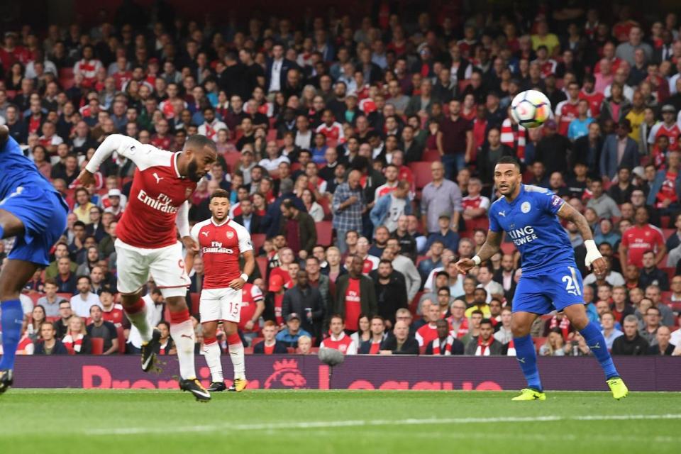 Maiden goal: Lacazette scores after 94 seconds against Leicester last term (Arsenal FC via Getty Images)