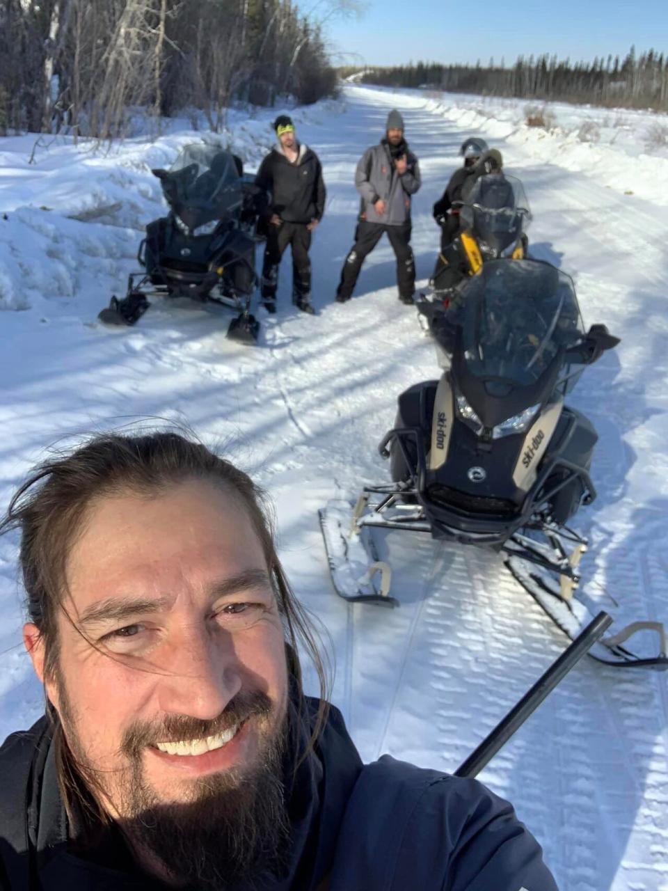 Jon McDonald with the team of field workers deploying remote wildlife monitoring cameras.