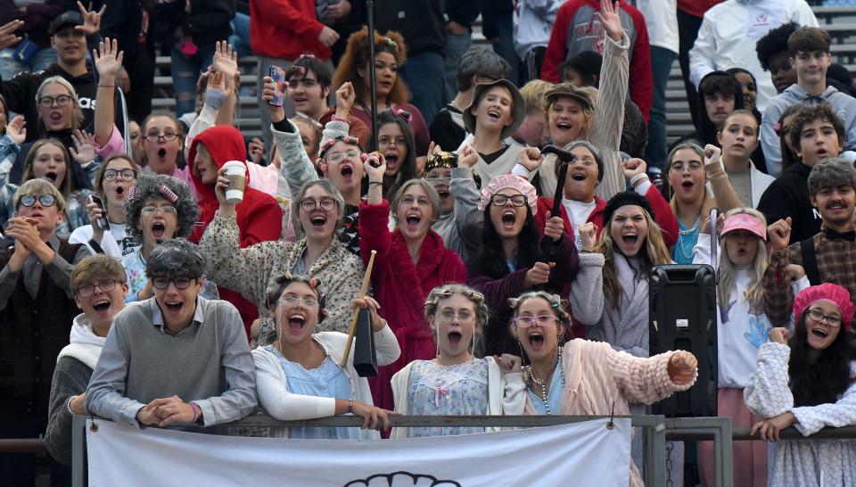 The Monroe student section theme this week was seniors. They dressed up as senior citizens at the varsity football game against Ann Arbor Huron Friday.