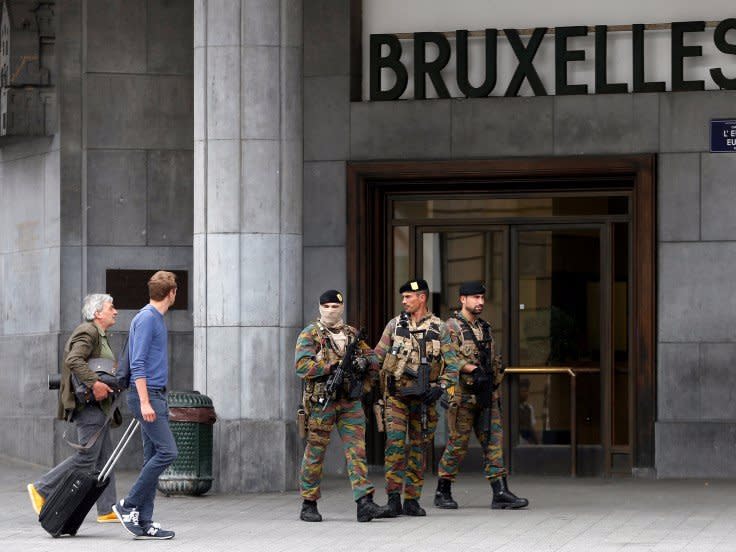 Belgian soldiers patrol outside the central train station where a suspect package was found, in Brussels, Belgium, June 19, 2016.   REUTERS/Francois Lenoir