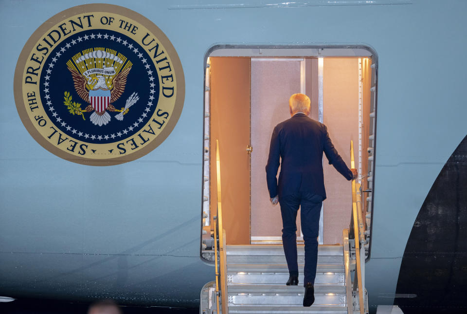 President Joe Biden boards Air Force One for a trip to Israel and Saudi Arabia, Tuesday, July 12, 2022, at Andrews Air Force Base, Md. (AP Photo/Gemunu Amarasinghe)