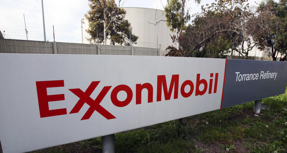 FILE - This Jan. 30, 2012, file photo shows the sign for the ExxonMobil Torrance Refinery in Torrance, Calif. A proposed oil pipeline in California that could allow ExxonMobil to resume production at three offshore platforms is expected to enter a critical phase of its government review in 2022. (AP Photo/Reed Saxon, File)