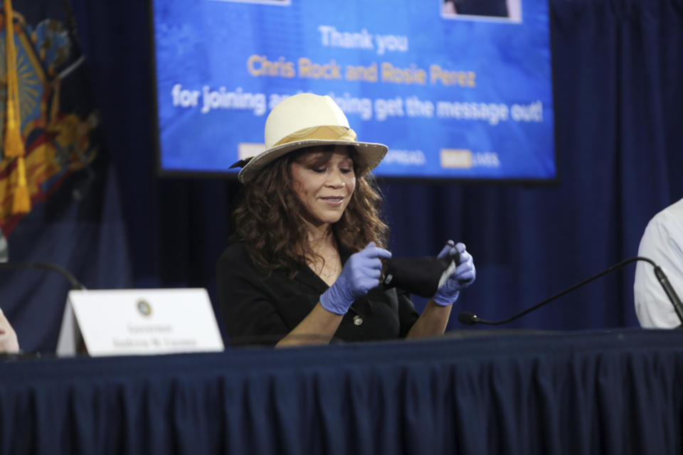 BROOKLYN, NY - MAY 28: Actress Rosie Perez pictured along with Comedian/Actor Chris Rock as they join New York Governor Andrew Cuomo during his covid-19 press conference to push mask use to protect against Coronavirus spread at Madison Square Boys and Girls Club on May 28, 2020 in Brooklyn, New York City. Credit: mpi43/MediaPunch /IPX