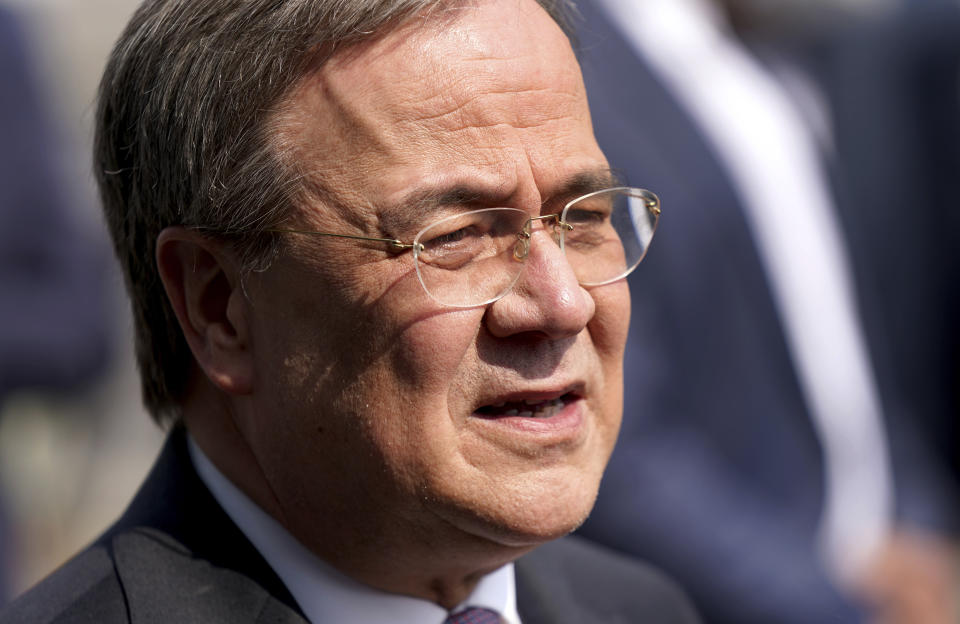 Armin Laschet, chairman of the German Christian Democratic party (CDU), addresses the media during a statement in front of the party's headquarters in Berlin, Germany, Monday, April 19, 2021. (AP Photo/Michael Sohn)