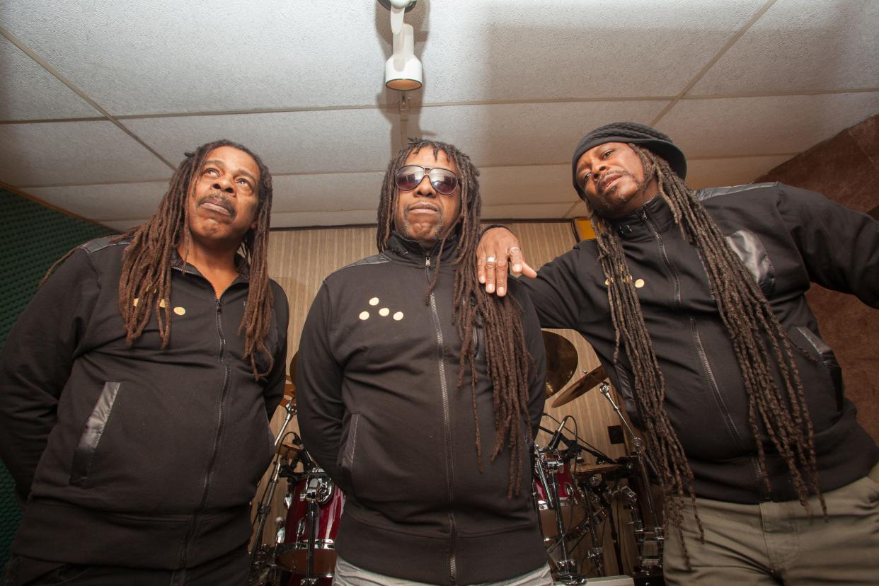 Dannis Hackney, Bobby Hackney and Bobbie Duncan from band, Death, prepare for rehearsal in Jericho.