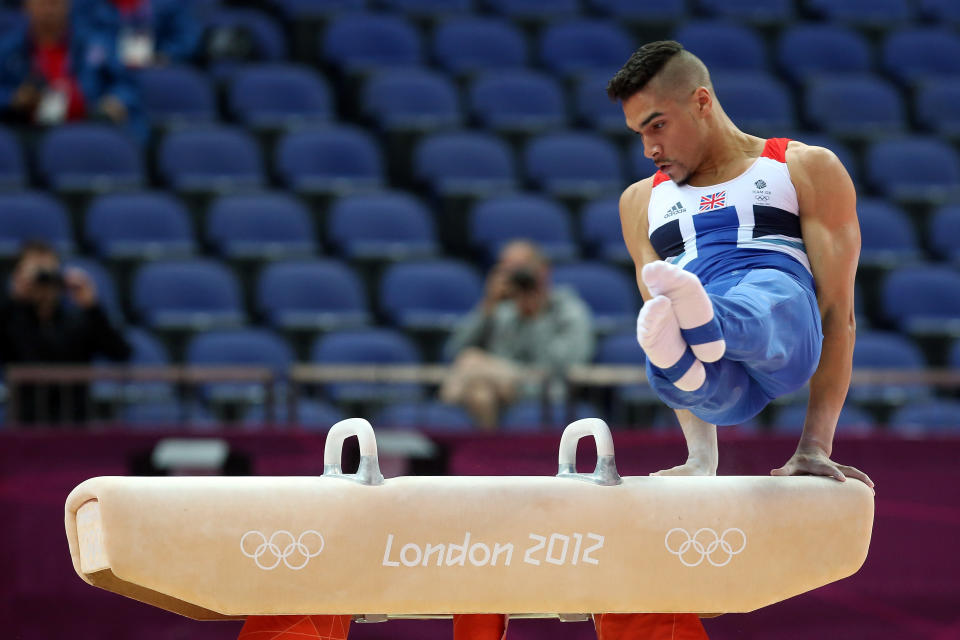 Louis Smith of Great Britain competes in the pommel horse for the qualification of the Artistic Gymnastics Men's Team on day one of the London 2012 Olympic Games at North Greenwich Arena on July 28, 2012 in London, England. (Photo by Ronald Martinez/Getty Images)