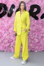 <p><strong>June 2018</strong> Bella Hadid made a statement in a bright yellow option, which she teamed with trainers and chunky jewellery.</p>