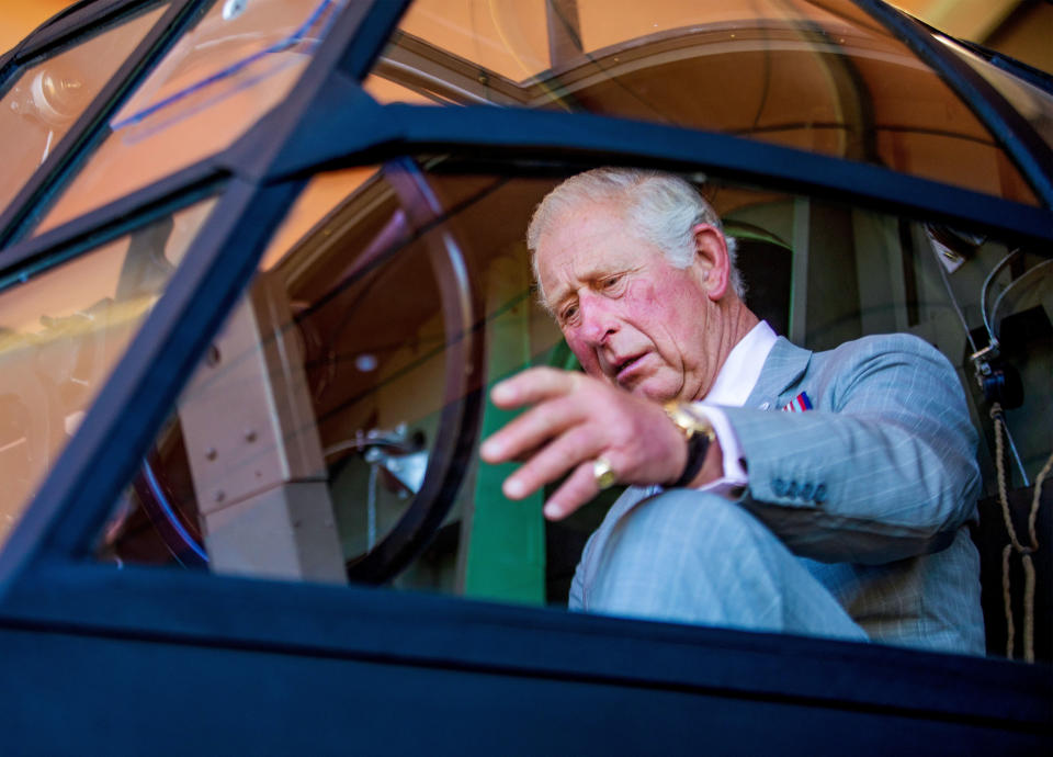 Prince Charles sits in the cockpit of a replication slider and poses with during his visit to the Airborne Museum Hartenstein in Oosterbeek. (Photo by DPPA/Sipa USA)