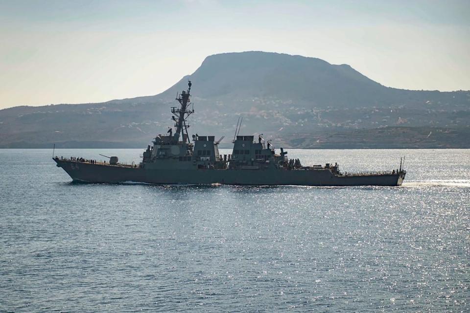 The guided-missile destroyer USS Carney intervened to protect commercial ships under attack by Houthi drones (AP)