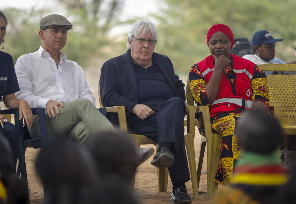 United Nations Under-Secretary-General for Humanitarian Affairs Martin Griffiths, center, meets with villagers during a visit to the village of Lomoputh in northern Kenya Thursday, May 12, 2022. Griffiths visited the area on Thursday to see the effects of the drought which the U.N. says is a severe climate-induced humanitarian emergency in the Horn of Africa. (AP Photo/Brian Inganga)