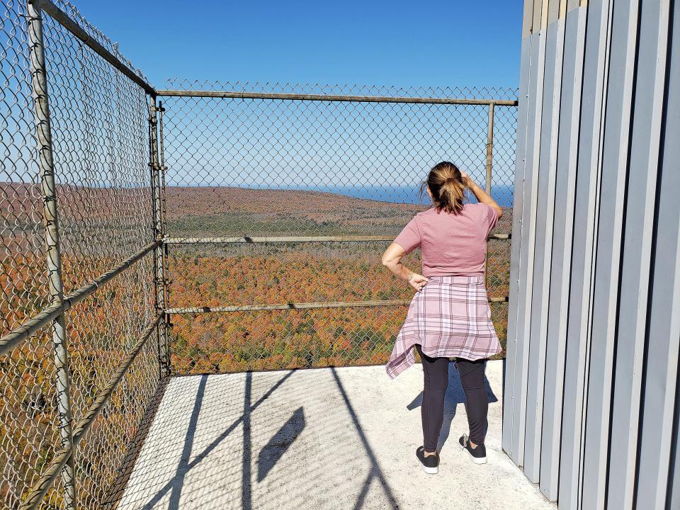 Lake Superior is visible beyond a sea of fall colors from the observation deck on the Copper Peak ski jump in Ironwood, Mich., October 7, 2021.