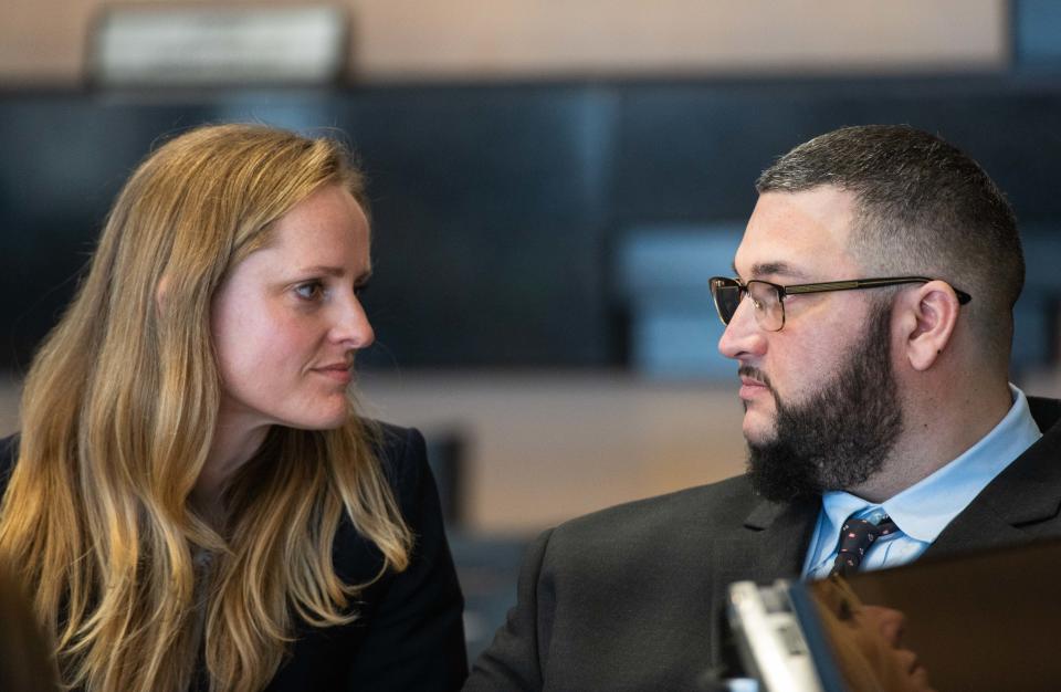 Defense attorney Mattie Fore, left, speaks to her client, Hipolito Fraguela, during jury selection in his first-degree murder trial on June 23, 2023, in the Palm Beach County Courthouse in West Palm Beach.