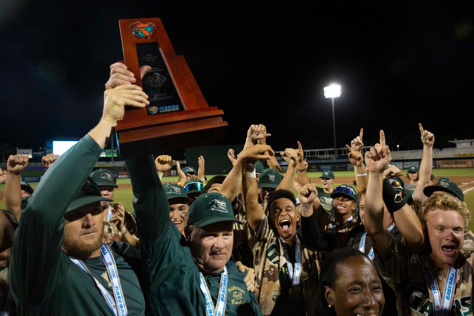 Island Coast celebrates after defeating Jensen Beach 8-7 in eight innings to win the FHSAA baseball Class 4A state championship, Wednesday, May 25, 2022, at Hammond Stadium in Fort Myers, Fla.