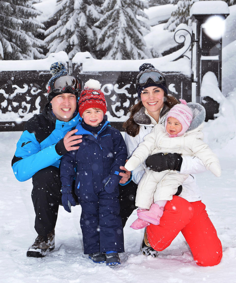 <p>The royal family released photos from their very first ski vacation as a family of four. A glowing Duchess Kate and Princess Charlotte match in chic white parkas, while mom pairs hers with bright red ski pants a fur collar, and Charlotte tops off her adorable look with a pink hat and pink booties.</p>