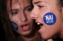 The word 'Yes' in Greek is seen on a sticker as pro-Euro demonstrators attend a rally in front of the parliament building, in Athens, Greece, June 30, 2015. REUTERS/Christian Hartmann