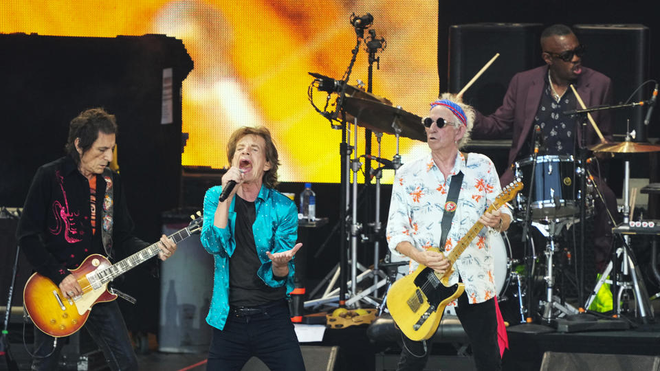 03 August 2022, Berlin: Ron Wood (l-r), Mick Jagger and Keith Richards of the band Rolling Stones perform during the anniversary tour "Sixty" at the beginning of the concert at the Waldbühne in Berlin. Behind them sits Steve Jordan on drums. (Repeat with other clip) Photo: Soeren Stache/dpa (Photo by Soeren Stache/picture alliance via Getty Images)