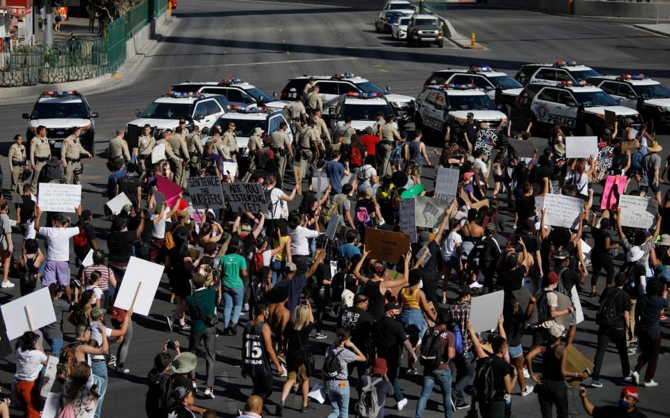 People protesting block traffic on Las Vegas Boulevard  - AP