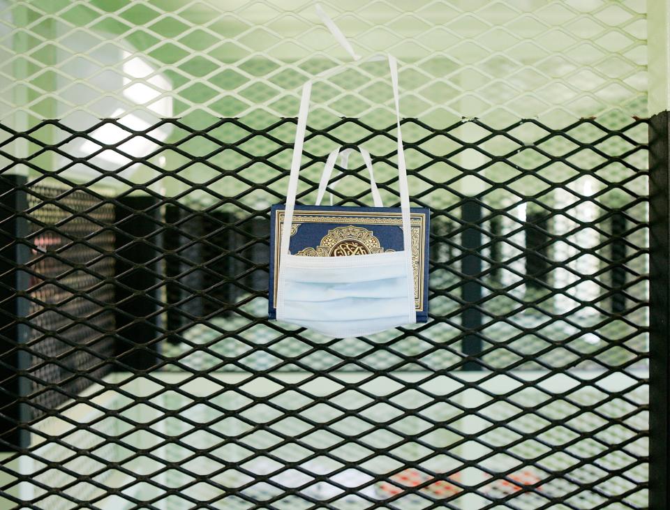 GUANTANAMO BAY, CUBA - MAY 09: (IMAGE REVIEWED BY U.S. MILITARY PRIOR TO TRANSMISSION) A Koran hangs in a cell of the Camp 2 cell block at Camp Delta May 9, 2006 in Guantanamo Bay, Cuba. Camp Delta was first occupied on April 28, 2002, when 300 detainees previously held at Camp X-Ray were transferred to Camp Delta. The rest of the detainees were moved on April 29. Camp X-Ray closed down on that same day. (Photo by Mark Wilson/Getty Images)