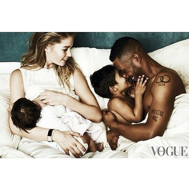 <p>Doutzen Kroes posed for the March 2015 issue of Vogue Netherlands while breastfeeding her daughter Myllena. The Victoria’s Secret model enlisted the help of the rest of her family, husband Sunnery James and son Phyllon, to put together this beautiful family snapshot. <i>[Instagram/Doutzen Kroes]</i></p>