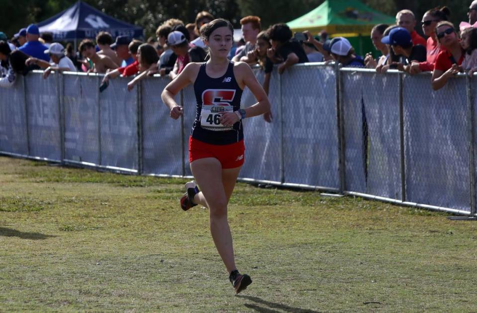 Sanger High junior Alexa Vaca placed 10th (19:09.22) in Division I at the CIF Central Section cross country championships at Woodward Park on Nov. 16, 2023.