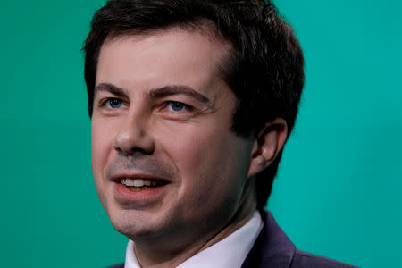 FILE PHOTO: 2020 presidential candidate South Bend (IN) Mayor Pete Buttigieg delivers remarks at the United States Conference of Mayors winter meeting in Washington, U.S., January 24, 2019. REUTERS/Yuri Gripas/File Photo